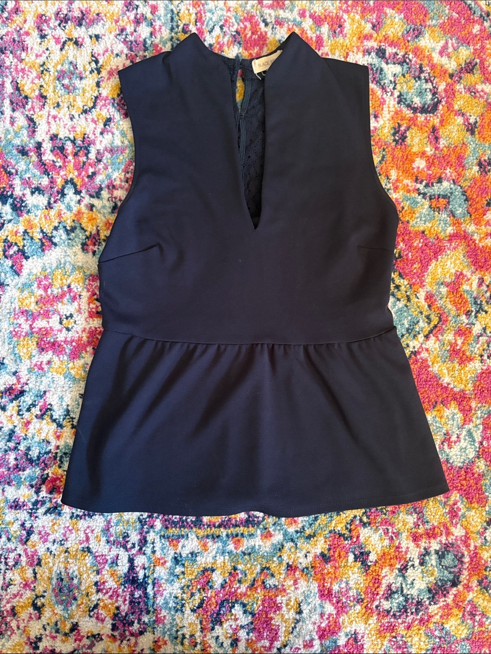 Black Swan Navy Peplum Sleeveless Top